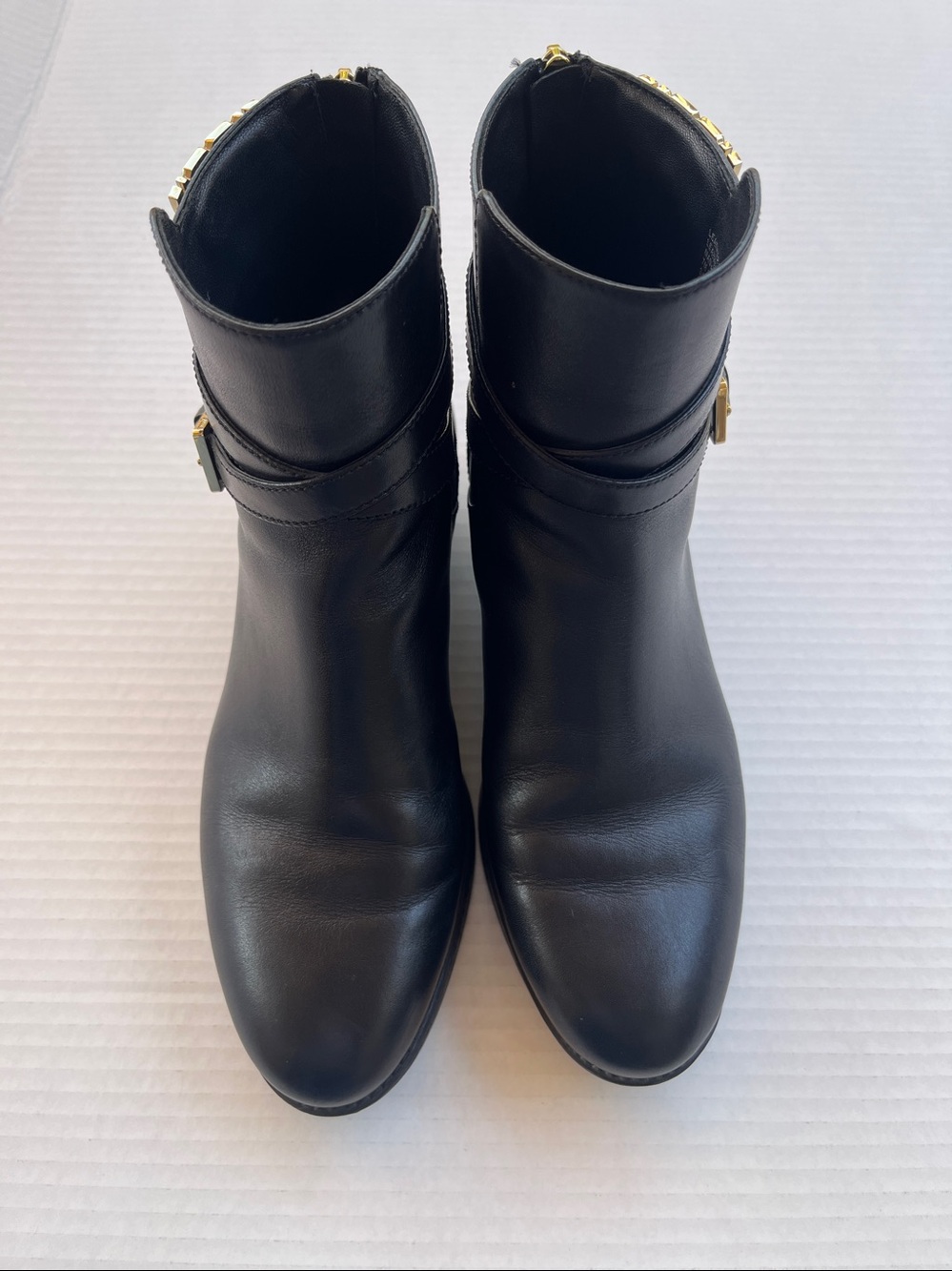 Tory Burch Sidney Black Leather Ankle Booties with Gold Buckle, 1” heels.